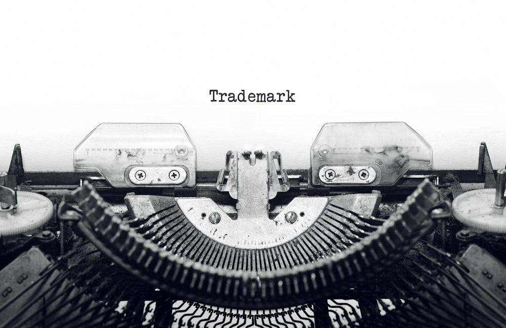 Trademark typed out on typewriter as a visual digital marketing tool