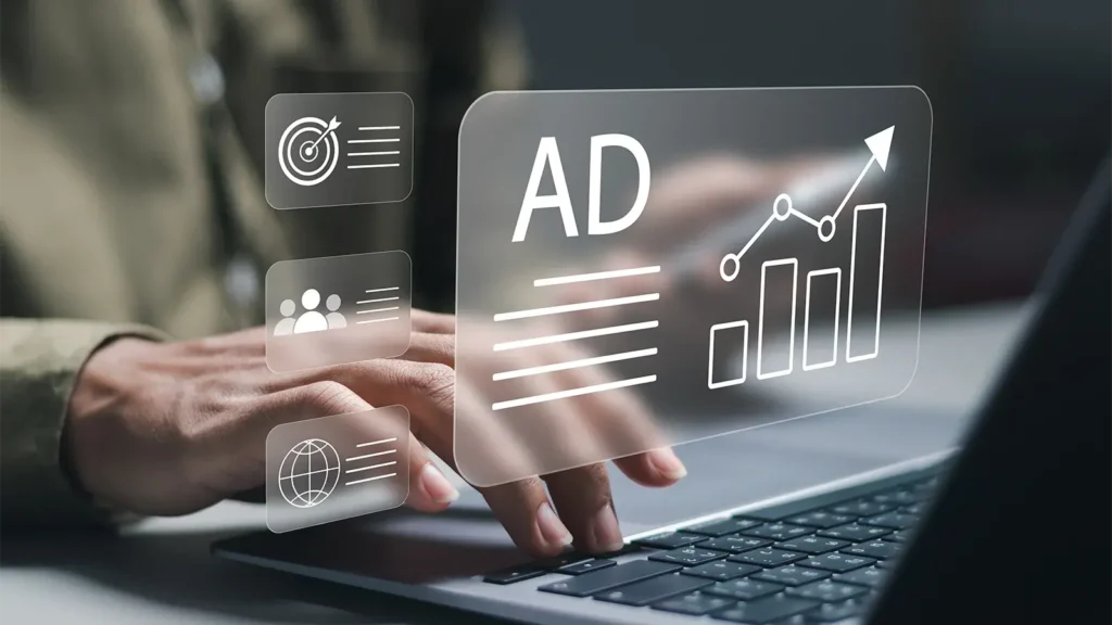 Businessman using laptop with advertising on website.