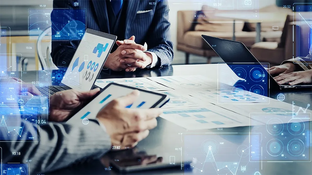 Group of business people meeting and digital technology concept