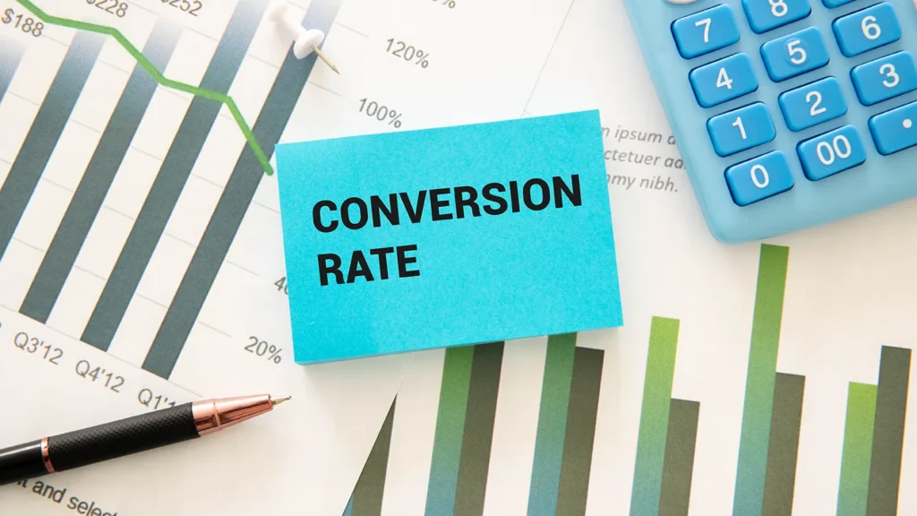 Text conversion rate on a white notebook sheet.