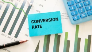 Text conversion rate on a white notebook sheet.