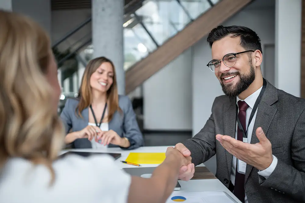 Businessman shaking hands with a client during a business meeting